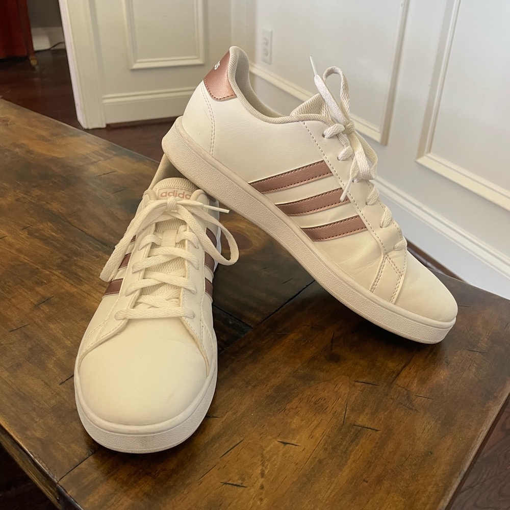 Adidas rose gold and white women’s shoe